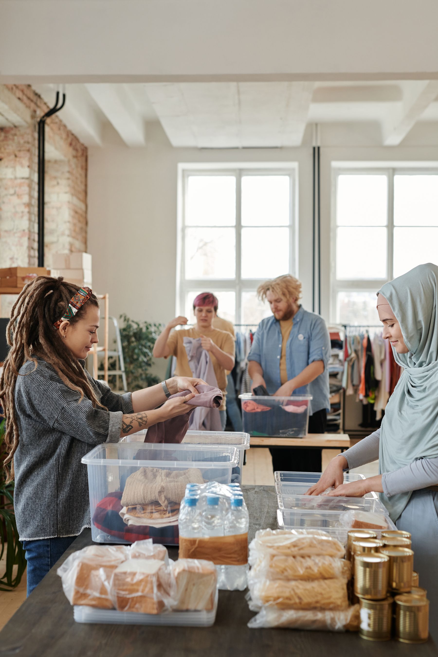 Community volunteers working together to organise donated supplies