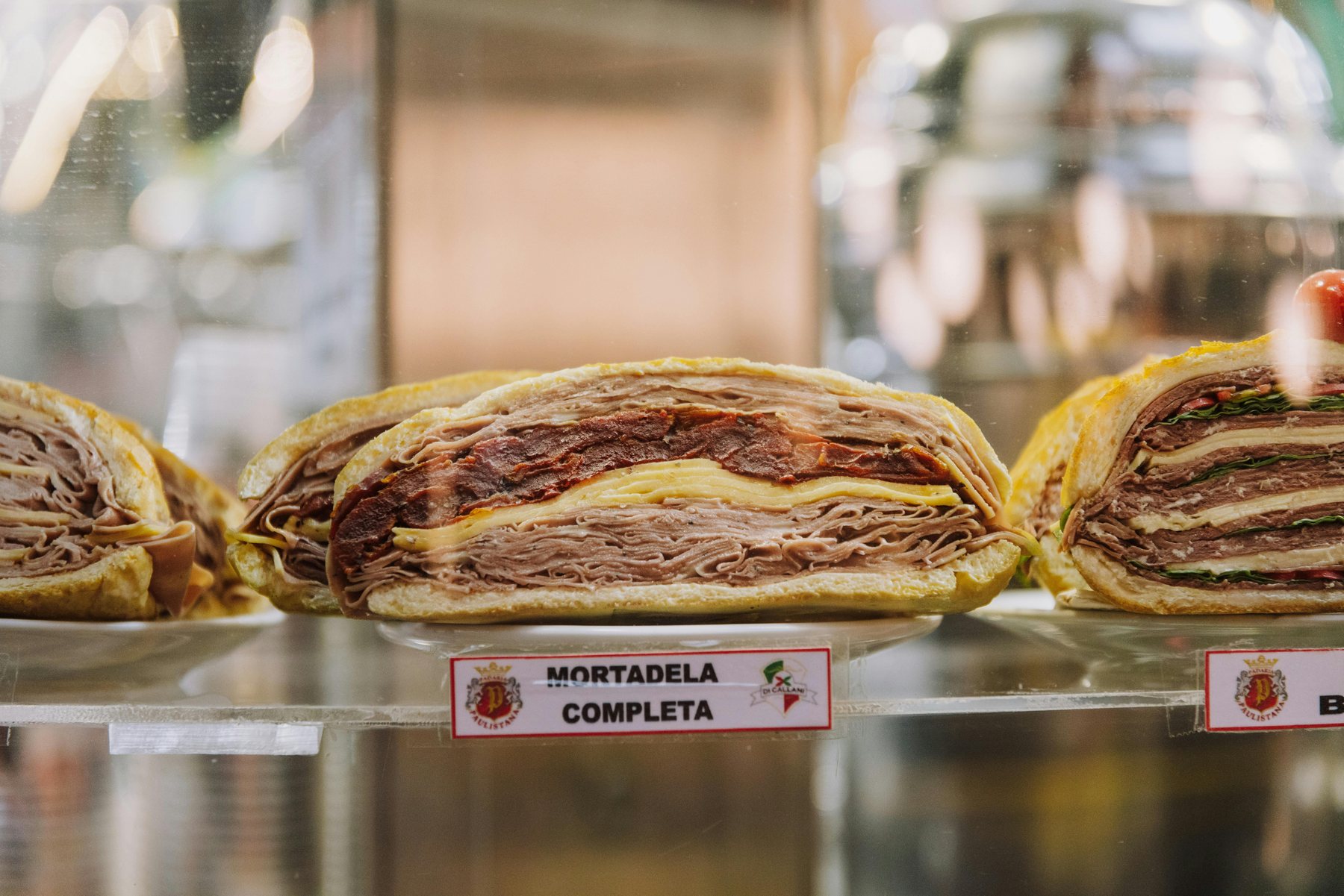 Assorted deli sandwiches on display